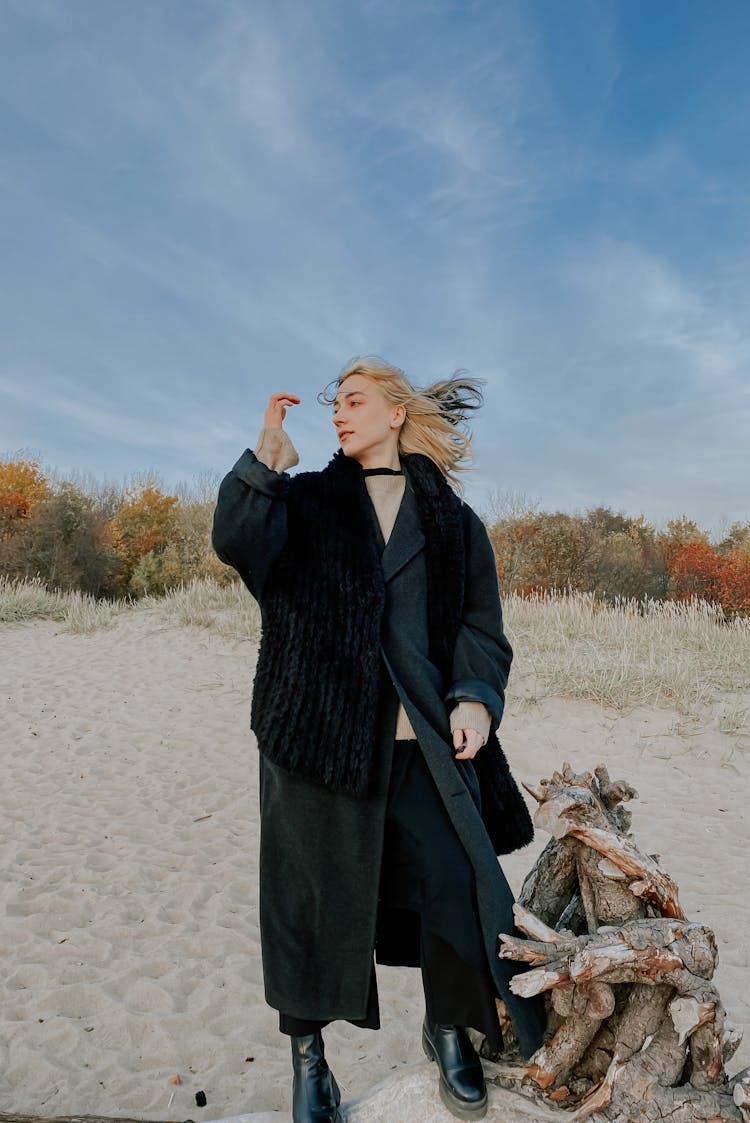 A Woman In A Black Coat