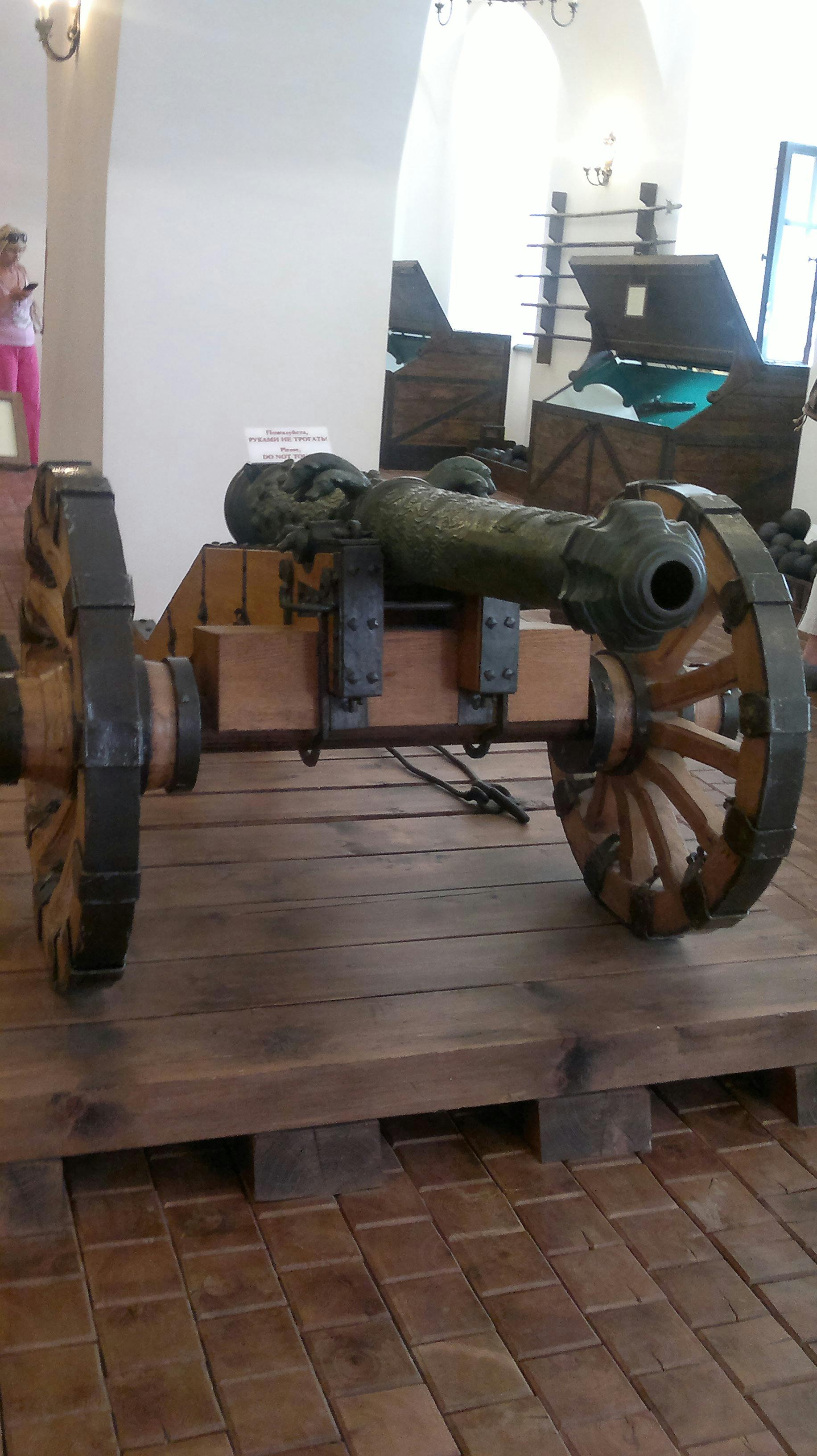 A close-up of a Super Mario action figure on a shelf.