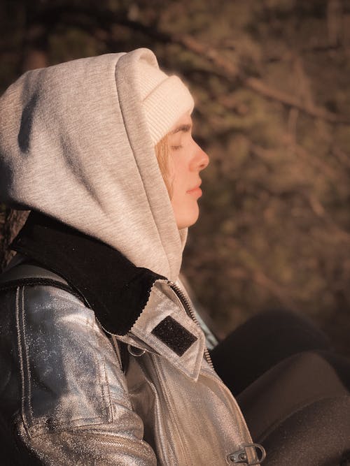 Man Wearing Gray Jacket and White Beanie Closed Eyes 