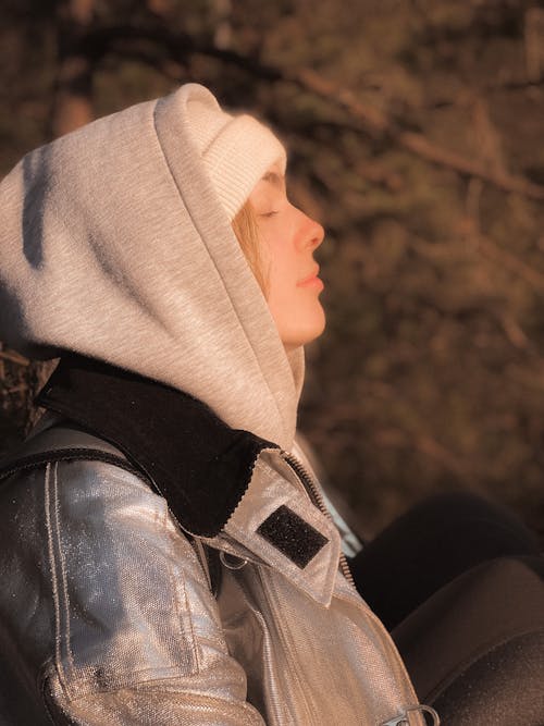 Man Wearing Gray Jacket and White Beanie Closed Eyes