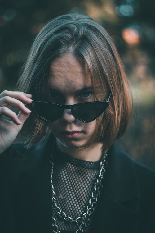 Woman in Black Blazer Wearing Black Sunglasses