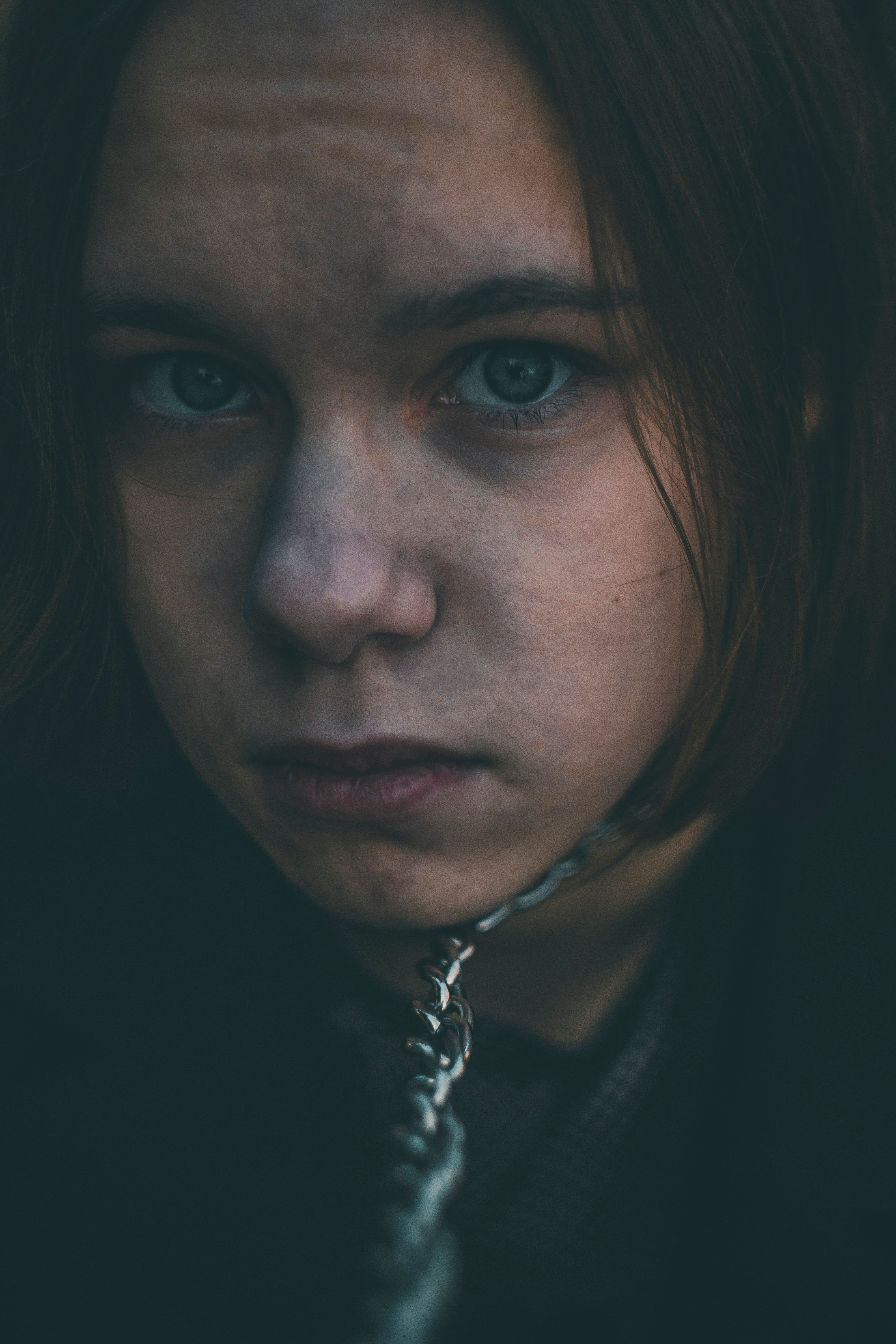 Woman in Black Shirt With Silver Chain Necklace · Free Stock Photo