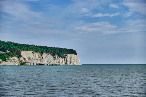 View of an Island on Sea Under Blue Sky