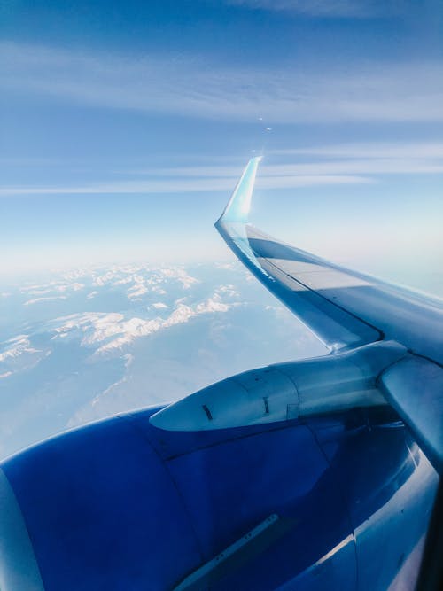 Безкоштовне стокове фото на тему «Авіація, блакитне небо, вертикальні постріл»