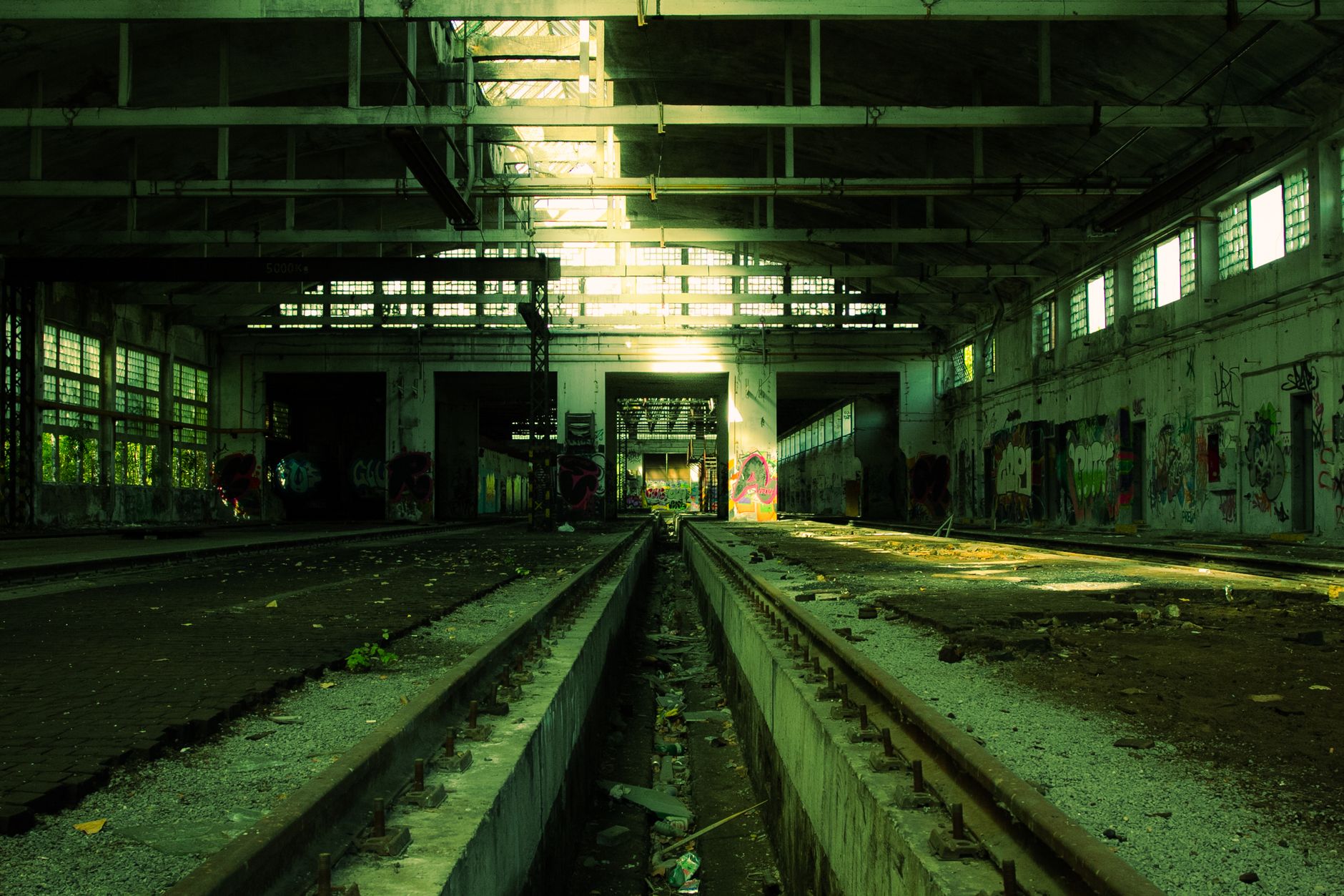 Explore the haunting beauty of an abandoned train station in Trnava, Slovakia, captured in moody lighting.