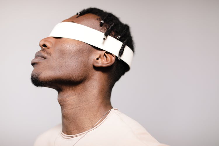 Close-up Shot Of A Blindfolded Man