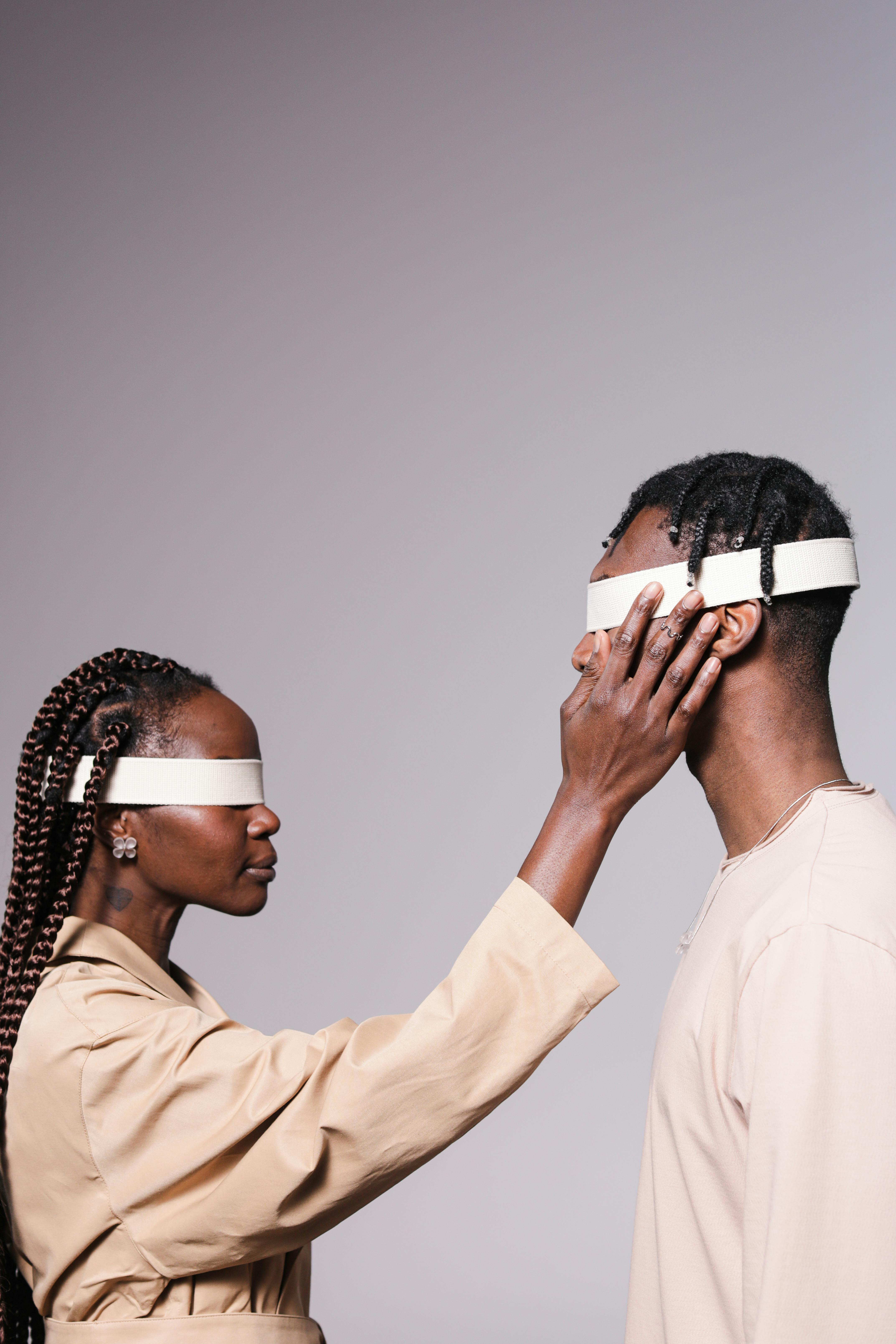 woman and man in blindfolds