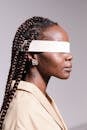 Woman Wearing Brown Coat Blindfolded