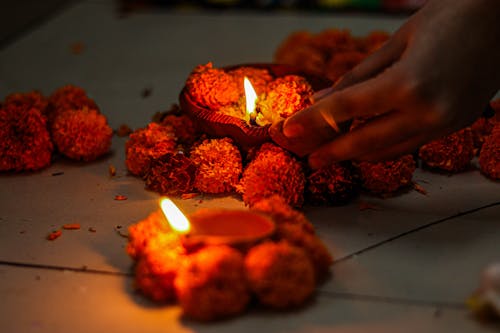 Free Person Holding Red Candles With Fire Stock Photo