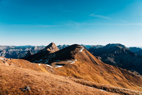 Gratis Immagine gratuita di catene montuose, cielo azzurro, escursione Foto a disposizione