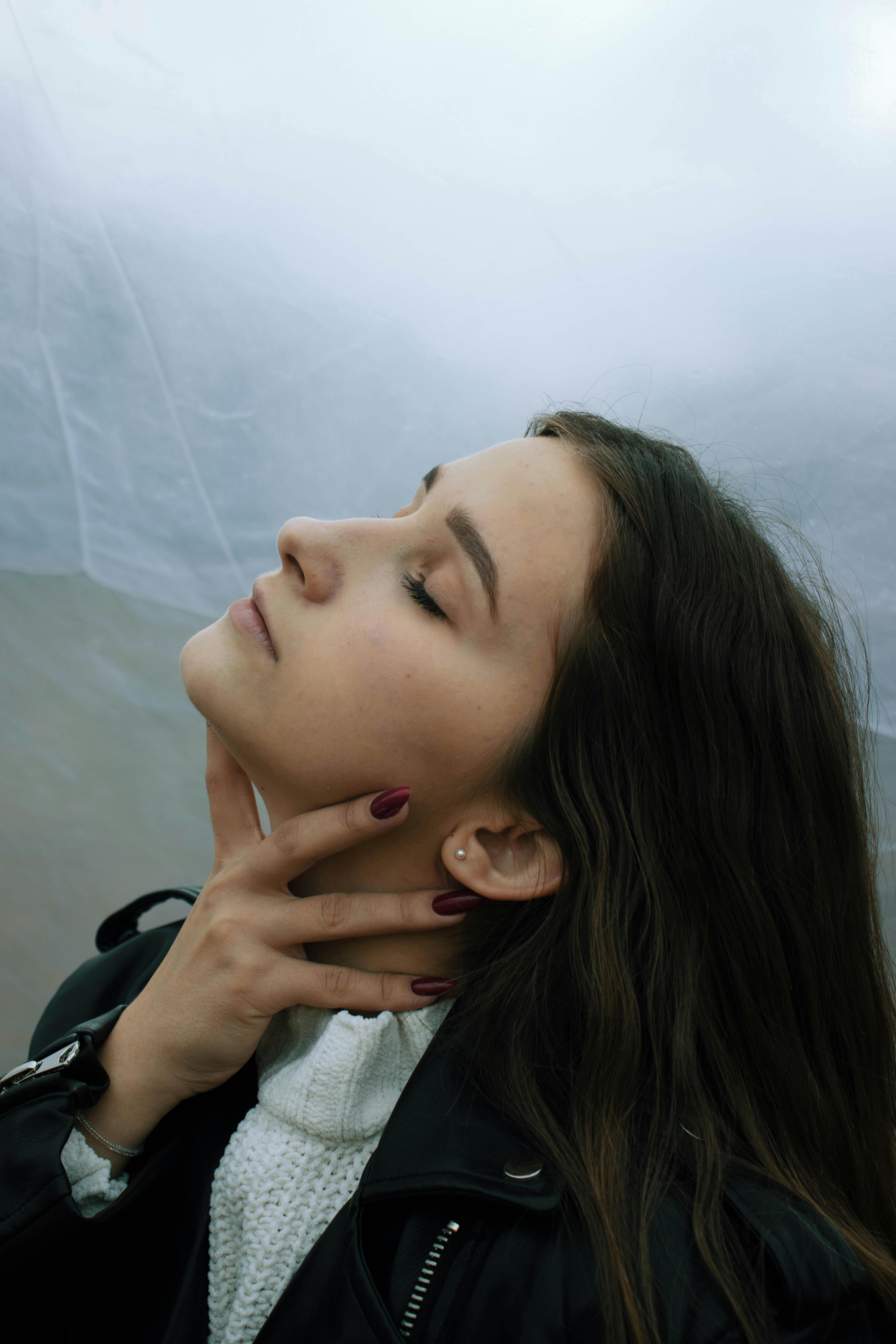 Woman Holding Her Neck · Free Stock Photo