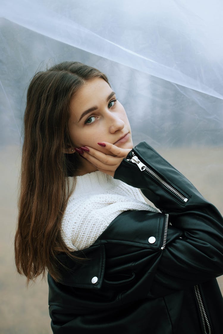 Portrait Of Young Woman In Leather Jacket