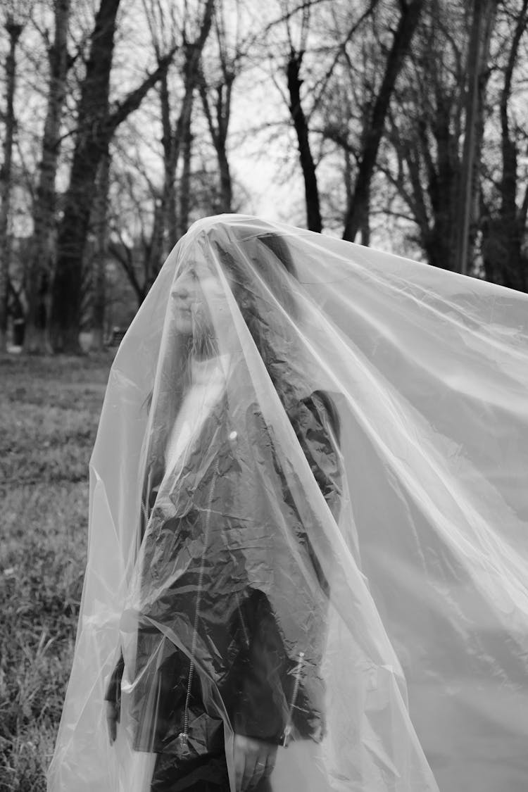 Woman In Jacket Standing Under Foil