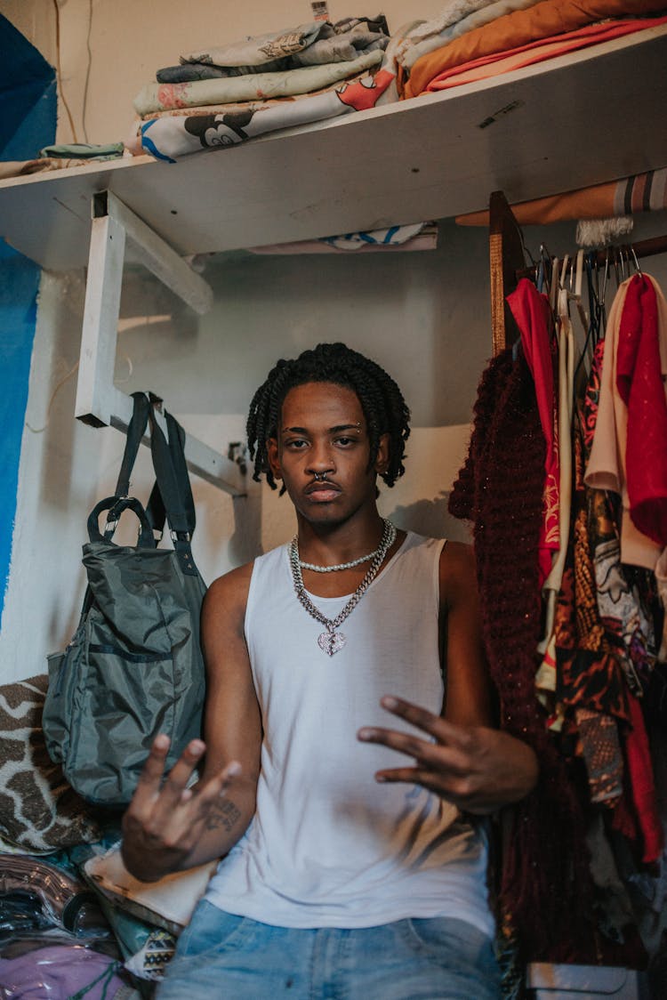 Man Standing In Home Closet