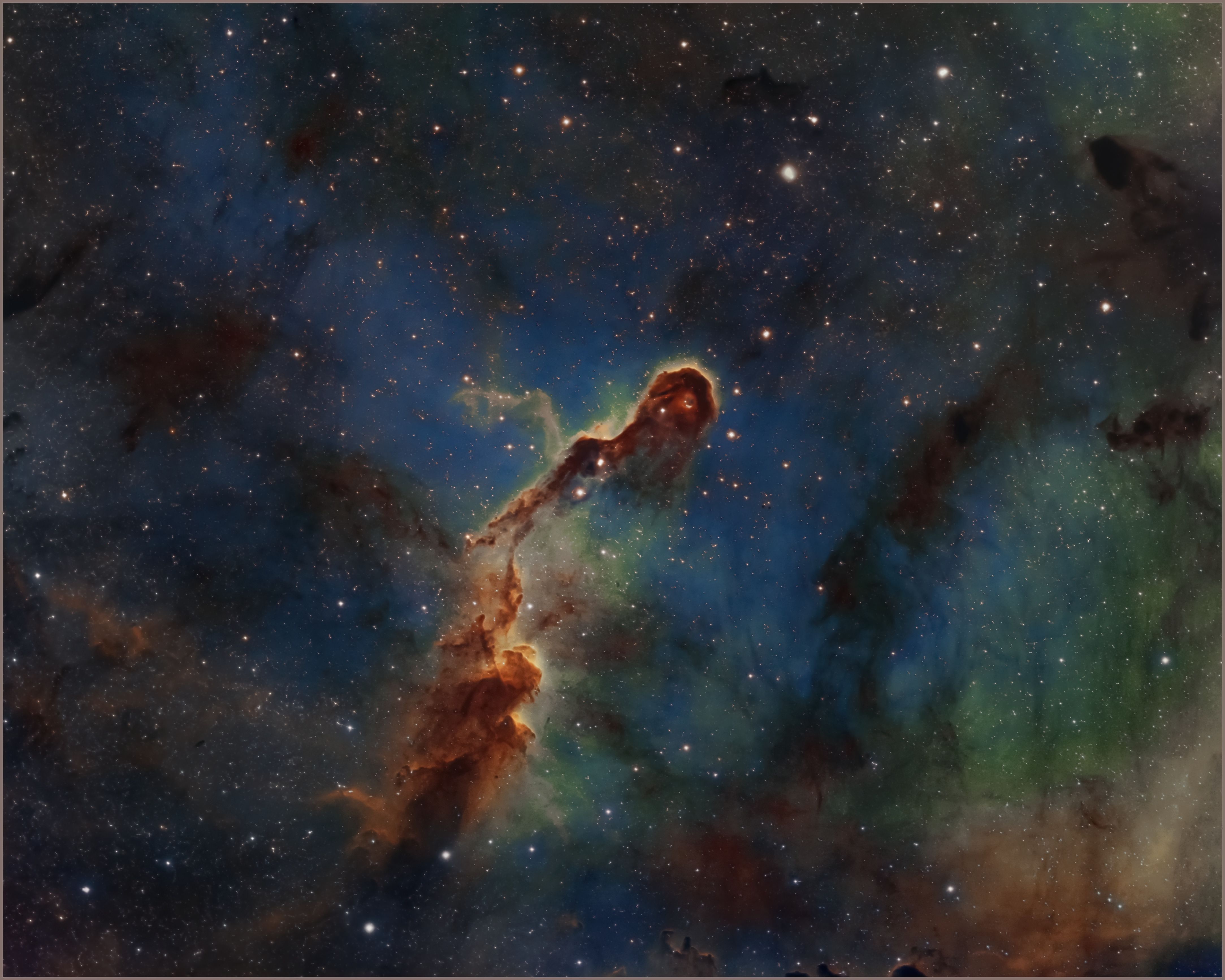 Beautiful cosmic view of a forming nebula against a stunning starfield, showcasing colorful celestial phenomena.