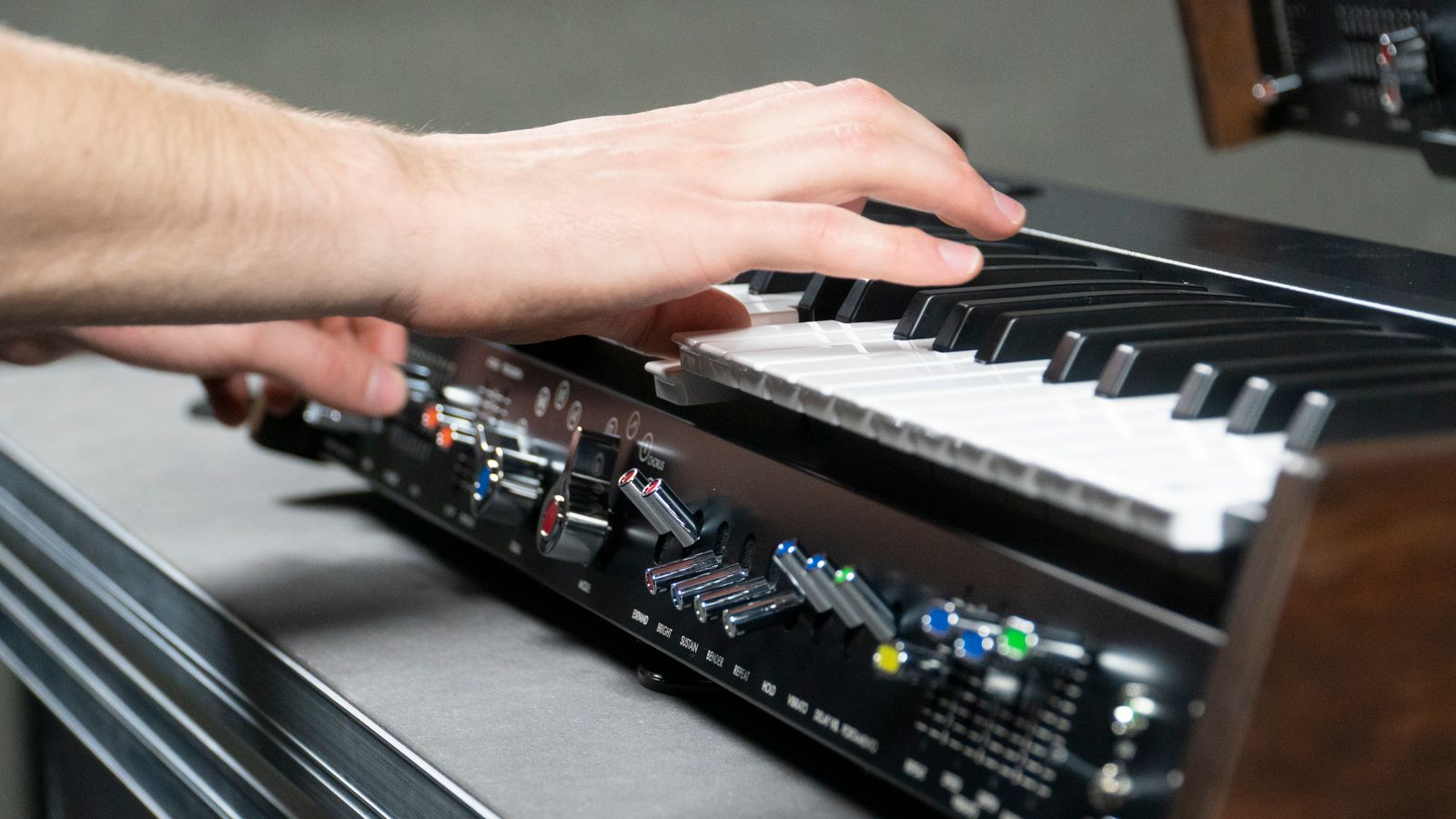 Hands playing a synthesizer — photo by TStudio on Pexels