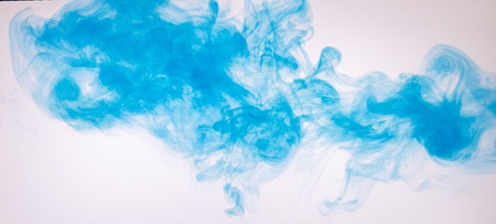 Blue ink swirling against white by Engin Akyurt on Pexels