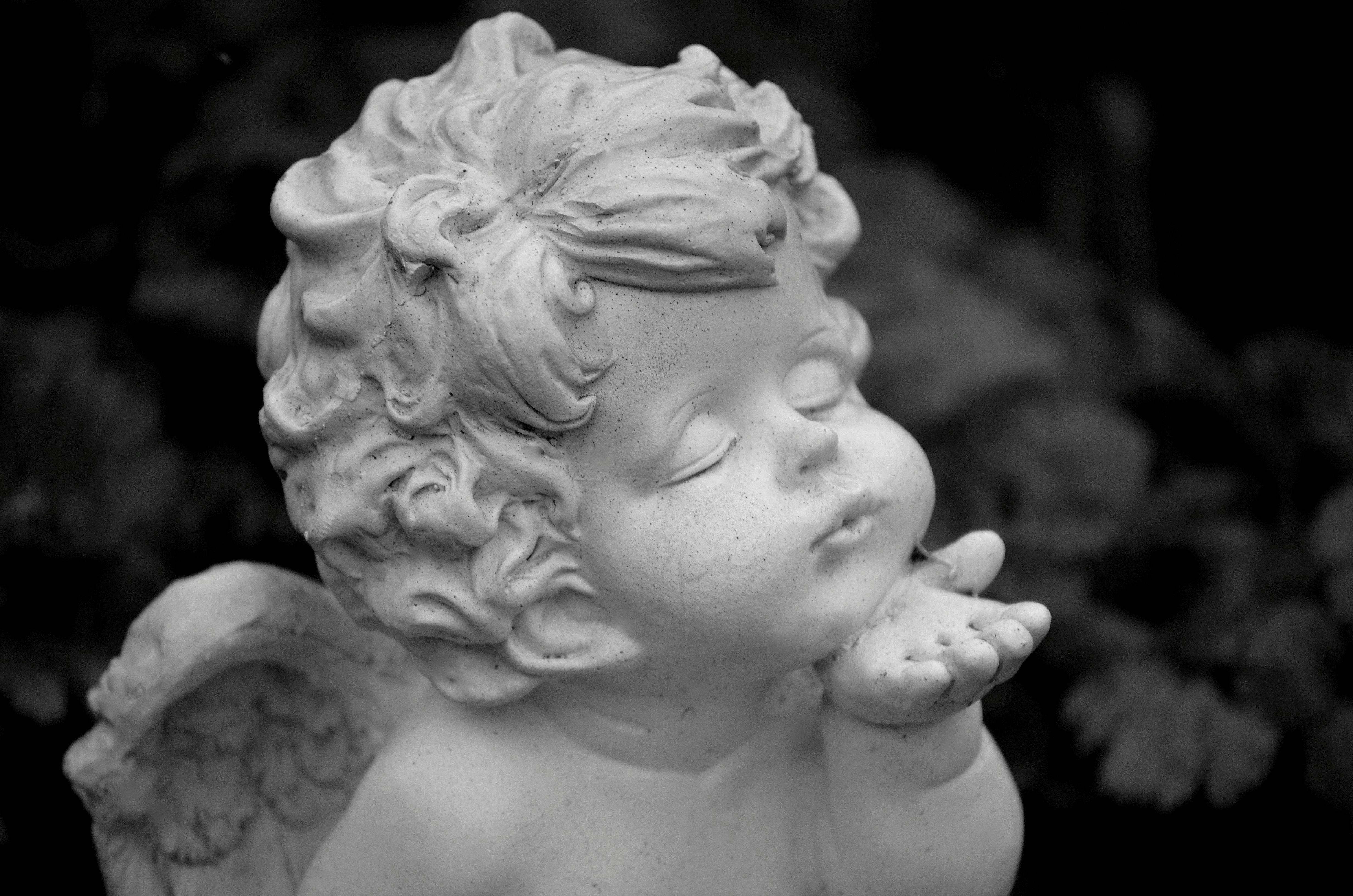crying baby angel statue