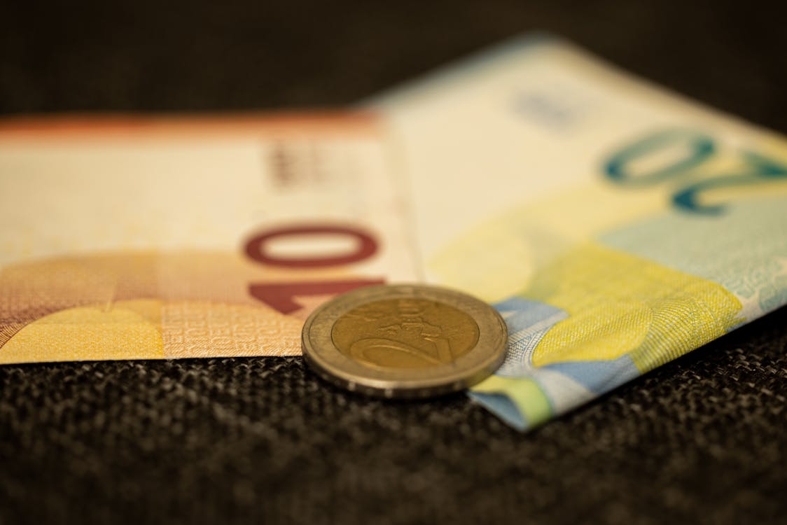 Free 10 Euro Bill on Black Textile Stock Photo