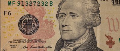 A detailed close-up of Alexander Hamilton on a United States ten-dollar bill.