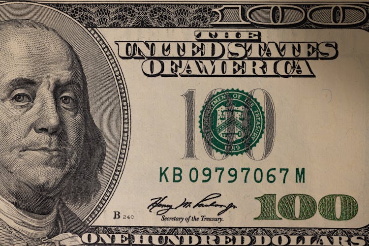 Close-Up Photography Of One Hundred Dollar Bill