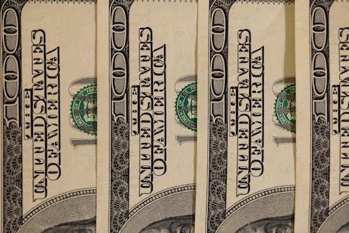 Dollar Bills in Close-Up Photography