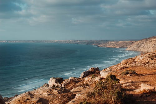 Photo of Rocks Near an Ocean