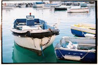 White and Brown Boat on Water