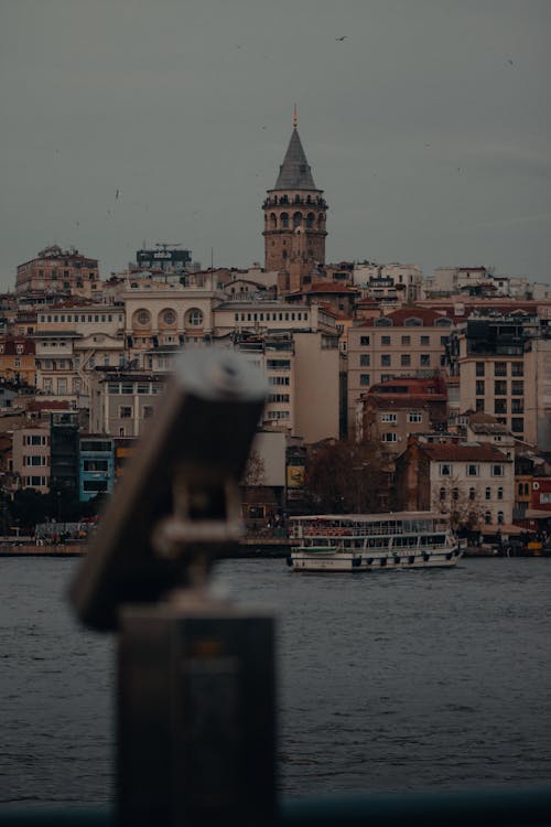 Concrete Buildings Near Body of Water