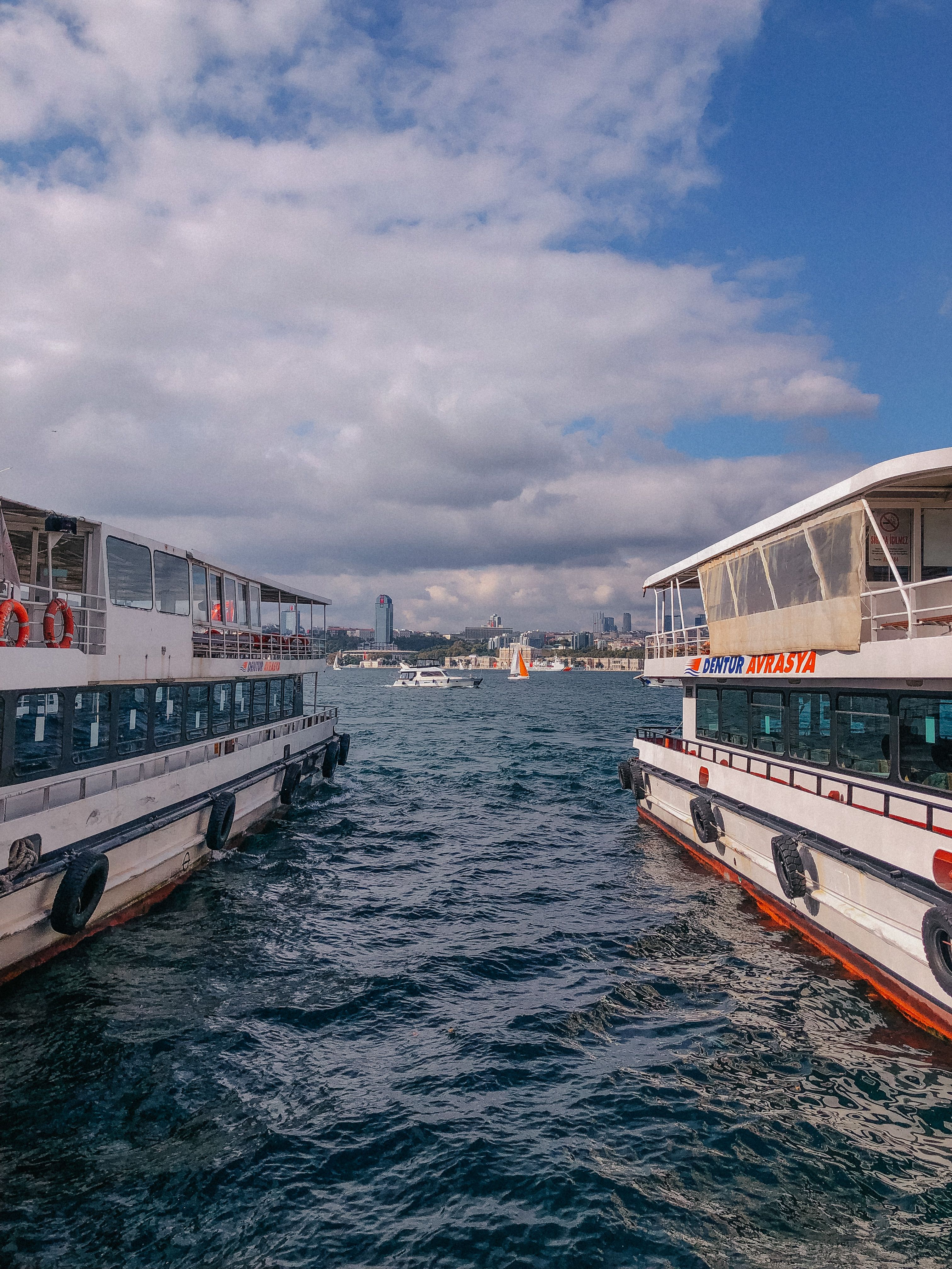 Boats on the Ocean under the Cloudy Sky · Free Stock Photo