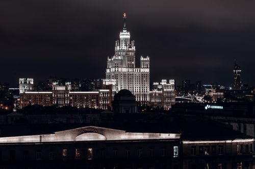Free Dramatic nighttime view of Moscow's historic architecture and cityscape, beautifully illuminated. Stock Photo