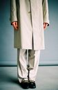 Man in Beige Coat Standing