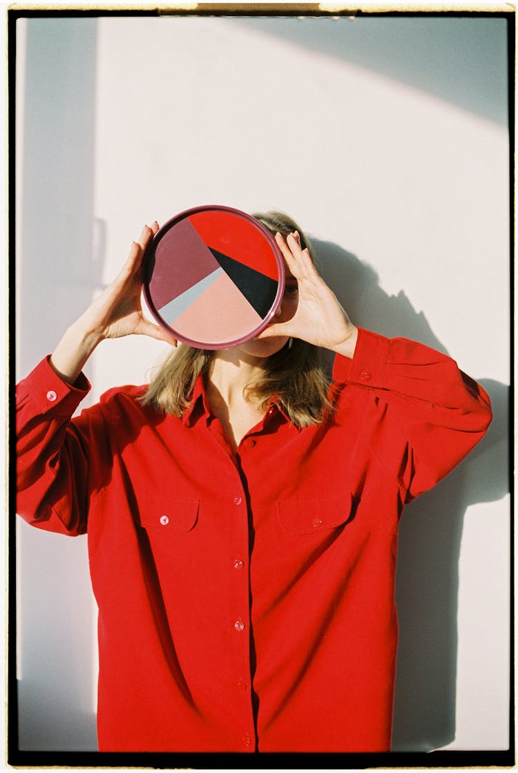 Woman Holding A Colorful Circle