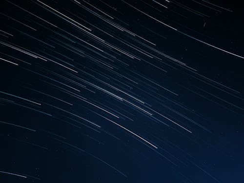 Blurred Motion of Stars in Navy Blue Sky