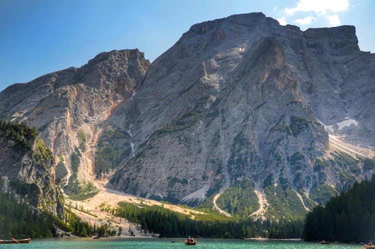 Lake With Boats And Mountain