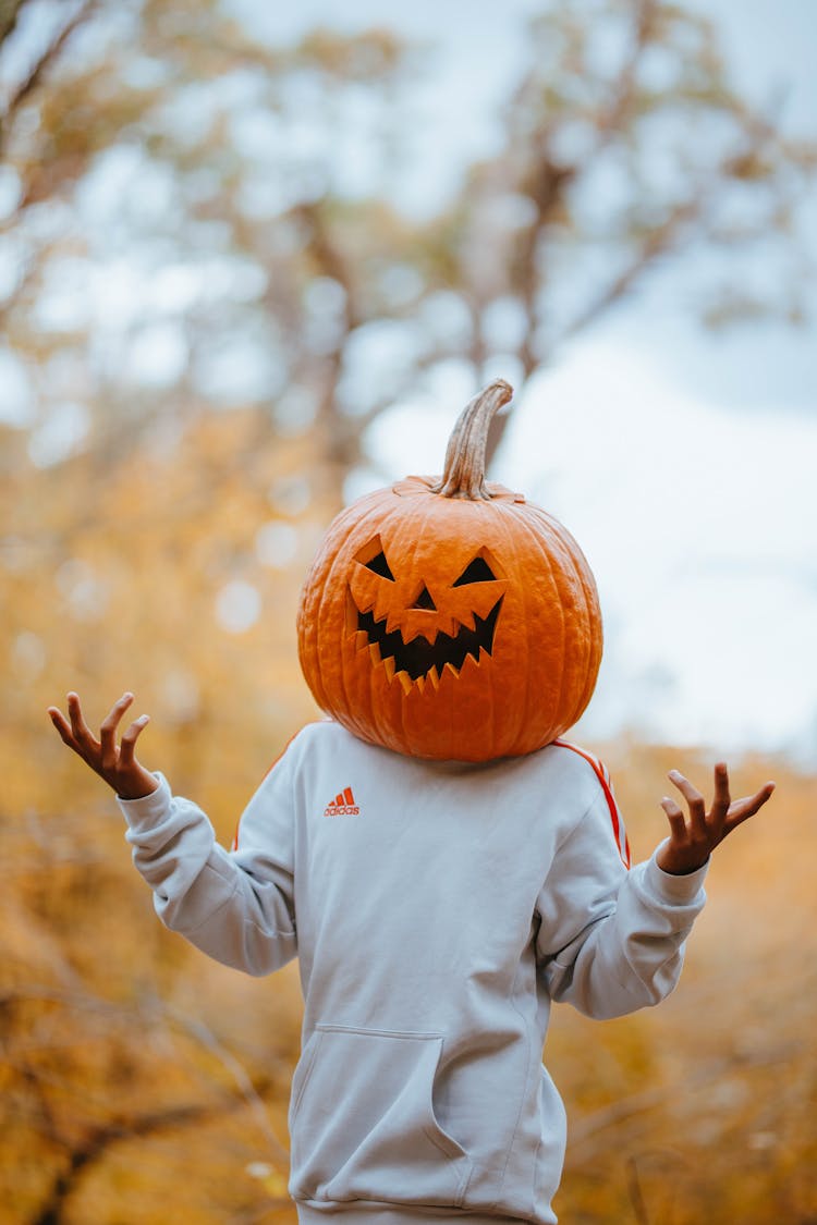 Person With Pumpkin On Head