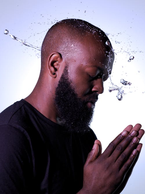Free stock photo of black man, praying, praying hands