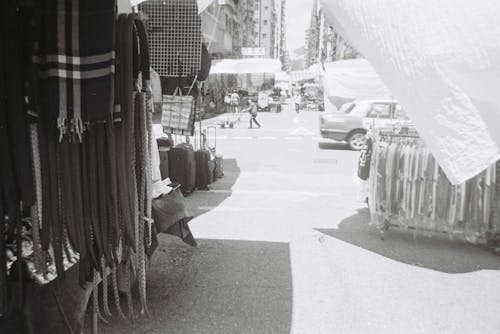 Vintage Black and White Photography of a City Market with Clothing
