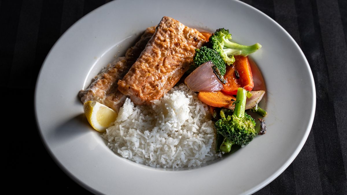 Rice bowl with fresh salmon and broccoli