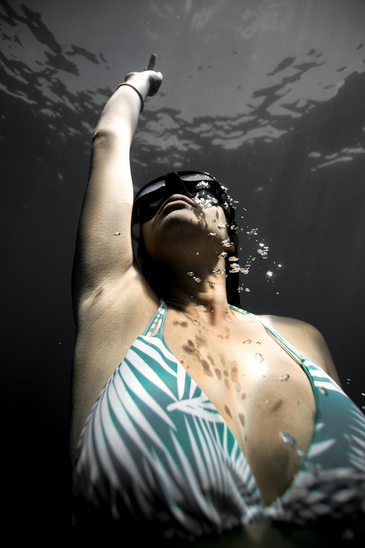 Woman Swimming Underwater 