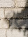 Shadow on Chipped Brick Wall