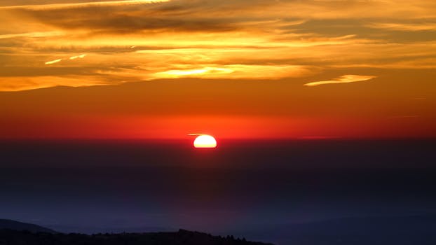 A captivating sunrise with dramatic sky colors at dawn.