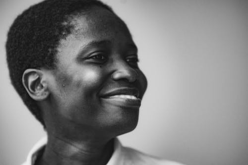 Grayscale Portrait of a Smiling Woman