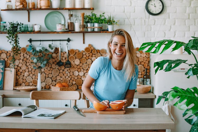 A Woman Laughing In The Kitchen