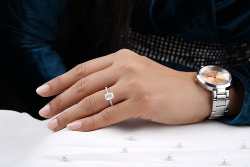 Woman Wearing Silver Diamond Ring