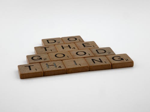 Free A Do the Good Thing Quote on Scrabble Tiles Stock Photo
