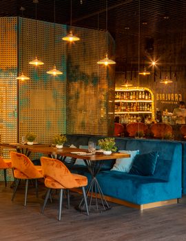Elegant restaurant setting with modern decor and ambient lighting, perfect for dining.