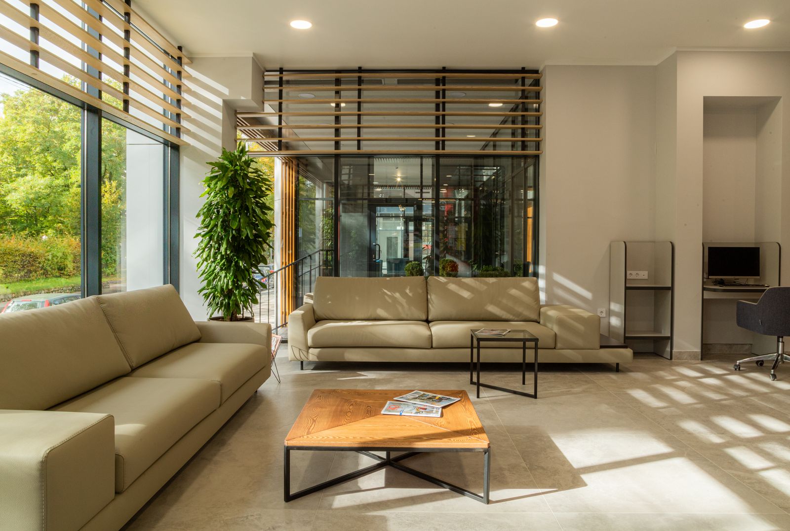 Spacious modern room with large windows and natural light — photo by Yura Forrat on Pexels