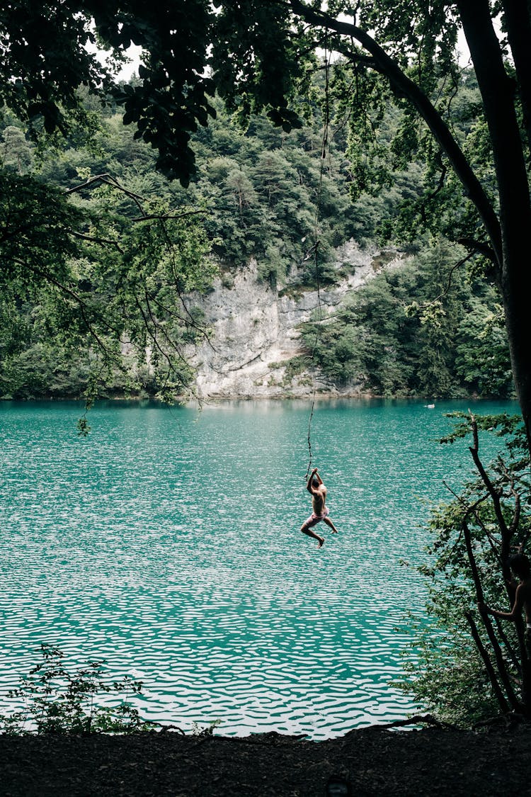 Person Swinging On Line