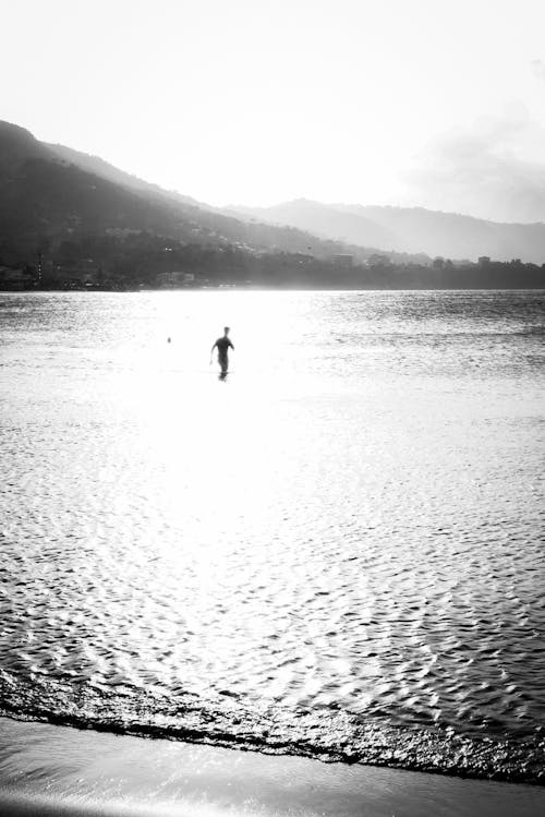 Silhouette of a Person on the Beach